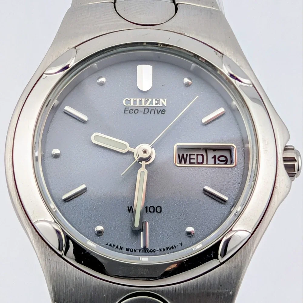 Citizen Eco-Drive E001-K17560 Gray Sunburst Dial Day/Date WR100 Women's Watch